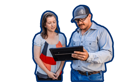 Utility worker reviewing information with a resident near maintenance equipment